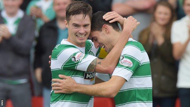 Mikael Lustig congratulates Celtic team-mate Tom Rogic on his goal