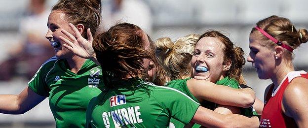 Irish players celebrate after Anna O'Flanagan scores against the USA