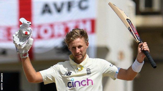 England captain Joe Root celebrates reaching his century against West Indies