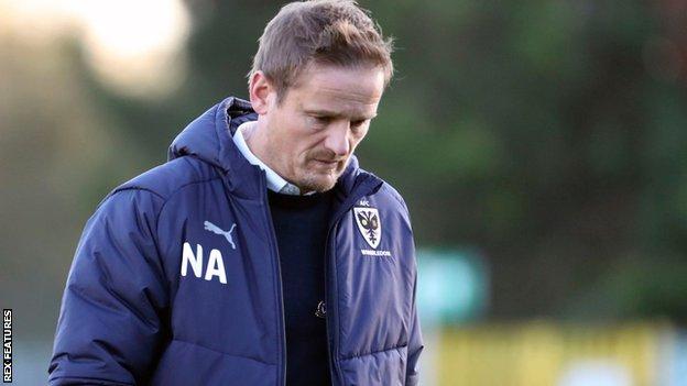 AFC Wimbledon boss Neal Ardley on the sidelines