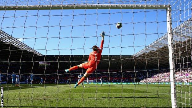 Tom carroll scores past Jack Butland