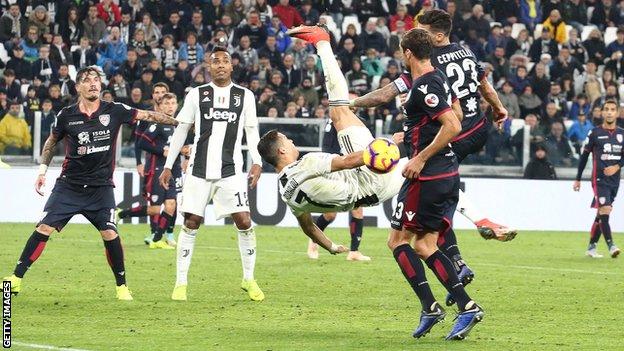 Cristiano Ronaldo attempts an overhead kick while playing for Juventus