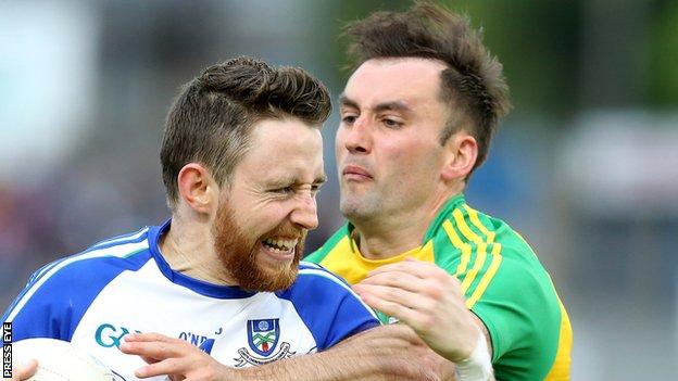 Donegal's Karl Lacey attempts to halt Monaghan's Owen Duffy