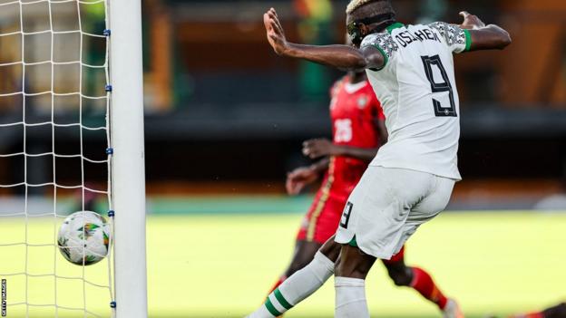 Nigeria striker Victor Osimhen scores a goal against Guinea-Bissau which is then ruled out for handball