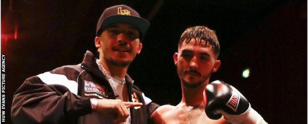 Lee and Andrew Selby pose in the ring together after Andrew had fought.