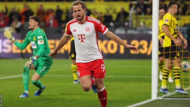 Harry Kane celebrates scoring Bayern Munich's second goal against Borussia Dortmund