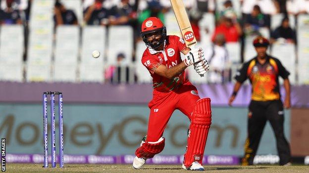 Oman's Aqib Ilyas batting against Papua New Guinea in the ICC Men's T20 World Cup