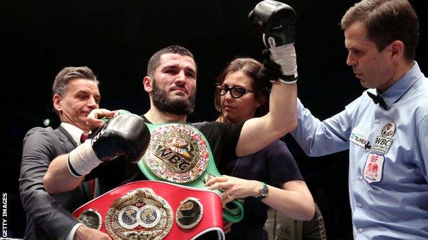 Artur Beterbiev is awarded his belts