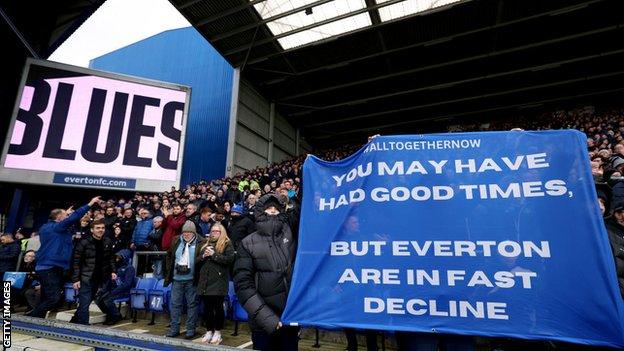 A Everton banner is held up at Goodison Park saying that the club is in decline