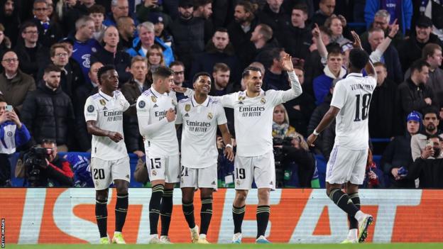 Rodrygo (centre) celebrates his second goal at Chelsea with Real Madrid team-mates