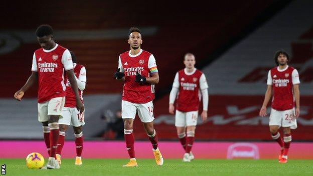 Arsenal players look dejected