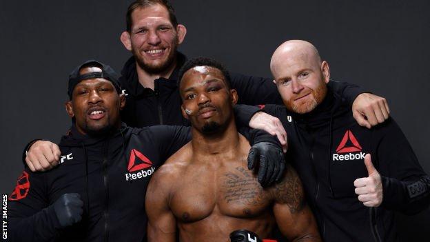 Lerone Murphy with his team after his UFC win over Douglas Silva de Andrade