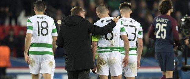 Celtic manager Brendan Rodgers consoles captain Scott Brown