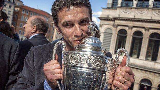 Remi Garde celebrates winning the French Cup in 2012