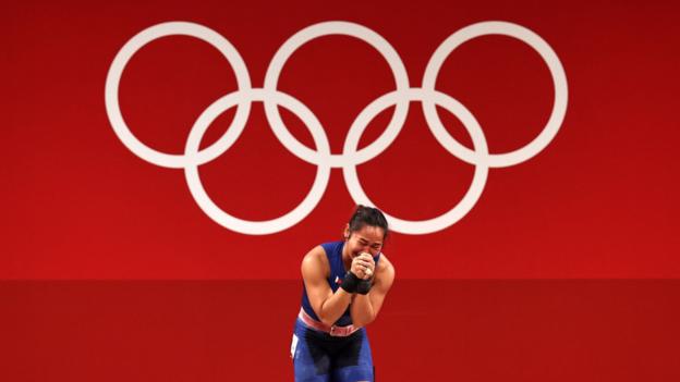  Hidilyn Diaz of the Philippines celebrates a historic victory as her country's first ever gold medal winner during the women's weightlifting 55kg on day three of the Tokyo Olympics