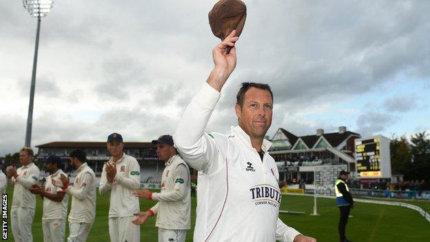 Marcus Trescothick raises his cap after completing his playing career in 2019