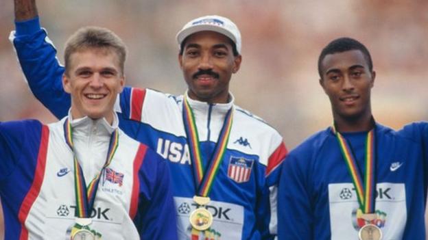 Greg Foster (centre) celebrates winning gold at the 1987 World Championships with Colin Jackson (right) and Jon Ridgeon