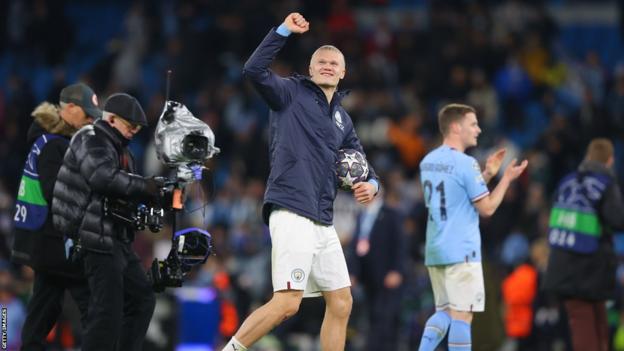 Erling Haaland with the match ball after scoring five against RB Leipzig in the Champions League