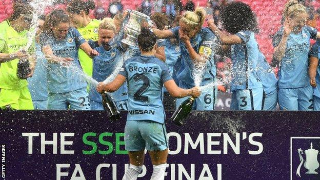Lucy Bronze celebrating with Manchester City team-mates after winning the Women's FA Cup in 2017