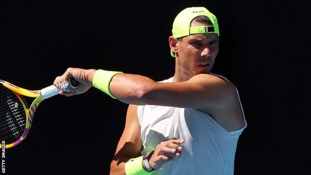 Rafael Nadal strikes during Australian Open training