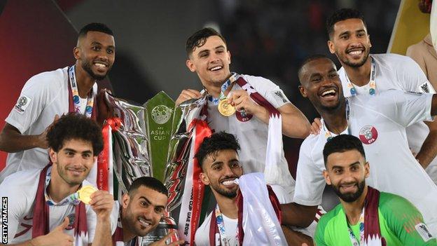 Qatar players celebrate winning the Asian Cup in 2019