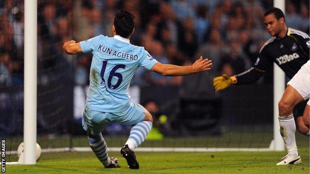 Manchester City's Sergio Aguero taps in the back post against Swansea