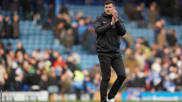 John Mousinho: Portsmouth head coach says play-off hopes still alive - BBC Sport