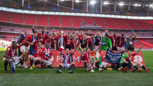 Morecambe celebrate their League Two play-off final win in 2021