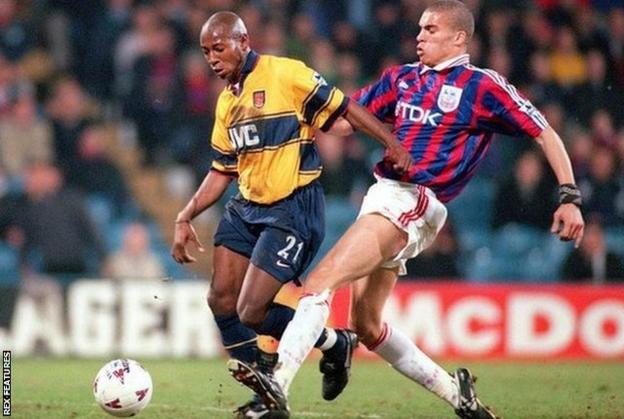 Valerien Ismael of Crystal Palace challenges Arsenal's Luis Boa Morte during an FA Cup tie in 1998
