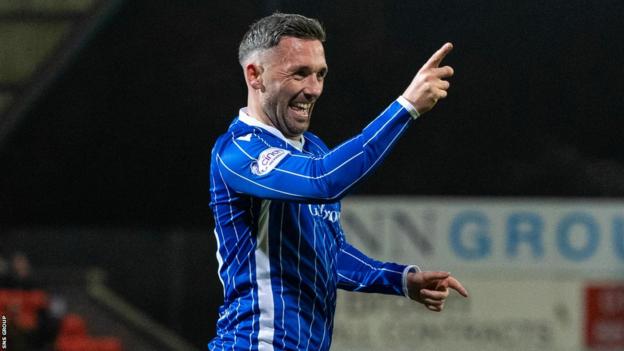 Nicky Clark celebrates opening the scoring against Motherwell on Tuesday