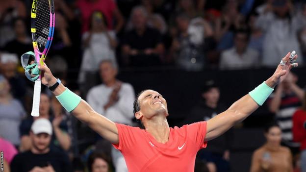 Rafael Nadal celebrates after beating Dominic Thiem at the Brisbane International