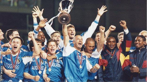 Chelsea player-manager Gianluca Vialli lifts the European Cup Winners' Cup after the 1998 final against Parma