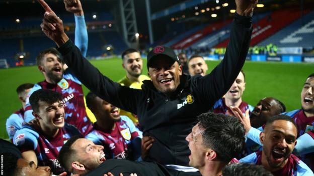 Burnley celebrate after winning the Championship title after beating bitter Lancashire rivals Blackburn Rovers at Ewood Park in April