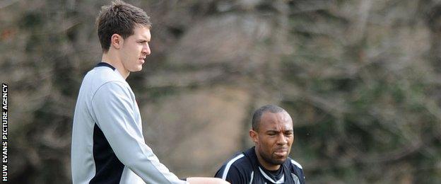Aaron Ramsey (left) with Danny Gabbidon during Wales training in 2011