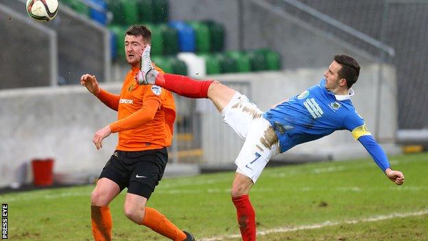 Gareth McKeown (left) in action for Carrick Rangers against Linfield on 30 January
