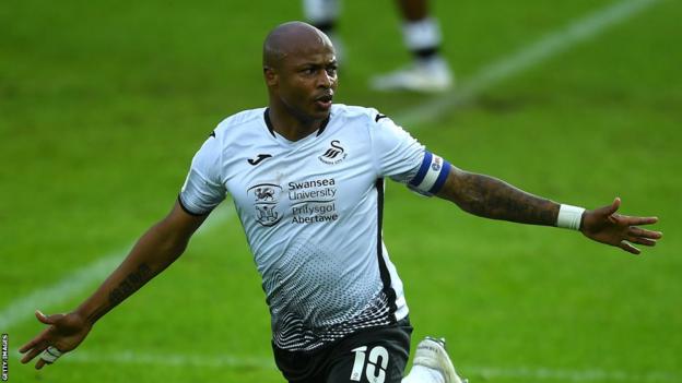 Andre Ayew celebrates a goal for Swansea