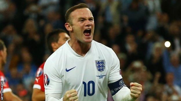 Rooney celebrates his record-breaking goal against Switzerland in 2015