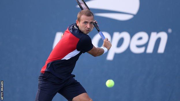 Dan Evans prepares to hit a backhand