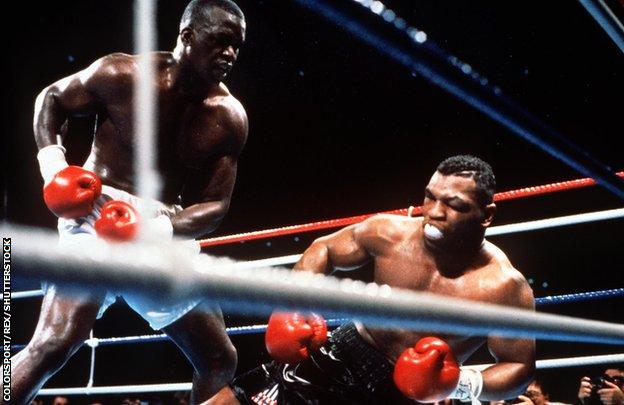 James (Buster) Douglas knocks out Mike Tyson in Tokyo in 1990