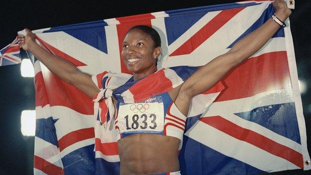 Denise Lewis celebrates winning gold