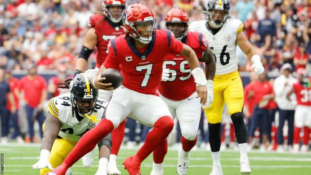 Houston Texans quarterback CJ Stroud runs with the ball against Pittsburgh