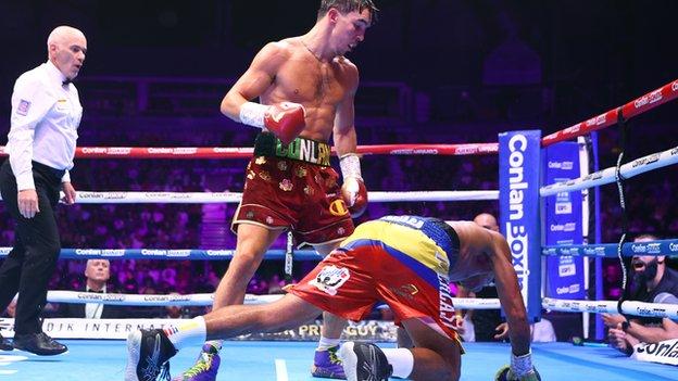 Michael Conlan watches Miguel Mariaga after one of his three knockouts