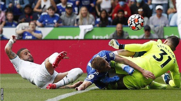 Manchester City keeper Ederson in action in his side's Premier League match with Leicester City