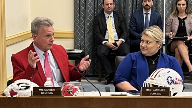 Congressman Buddy Carter and Congresswoman Kat Cammack debate NIL regulations while surrounded by memorabilia of their respective teams