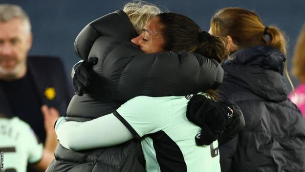 Chelsea manager Emma Hayes and Catarina Macario celebrate a