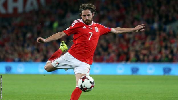 Joe Allen in action for Wales