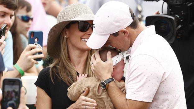 Rory McIlroy's wife Erica and their daughter Poppy join in the celebrations