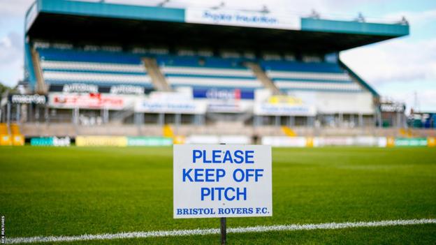 A 'please keep off the pitch' sign at the Memorial Stadium