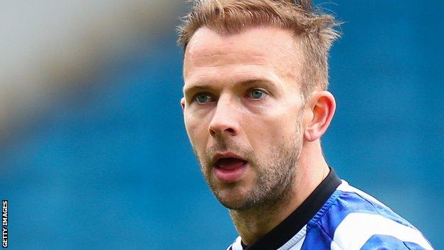 Rhodes: Huddersfield Town re-sign striker after Wednesday - BBC Sport
