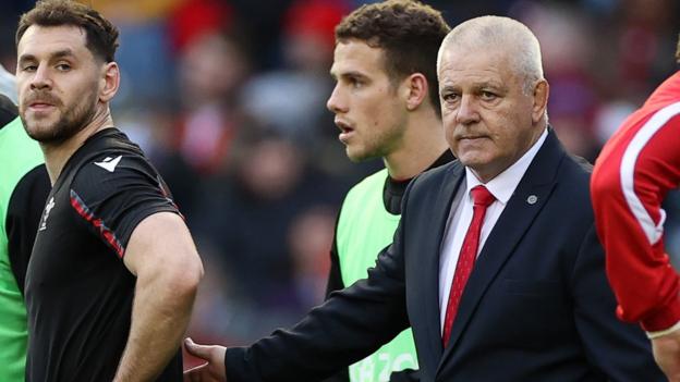 L-R: Wales scrum-halves Tomos Williams and Kieran Hardy with Warren Gatland before kick off against Scotland in the 2023 Six Nations at Murrayfield